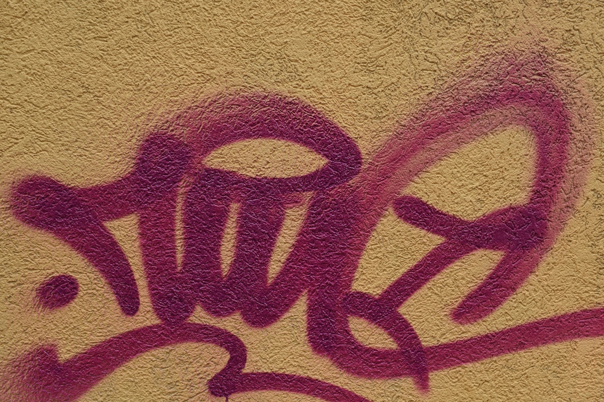 purple and white love print textile