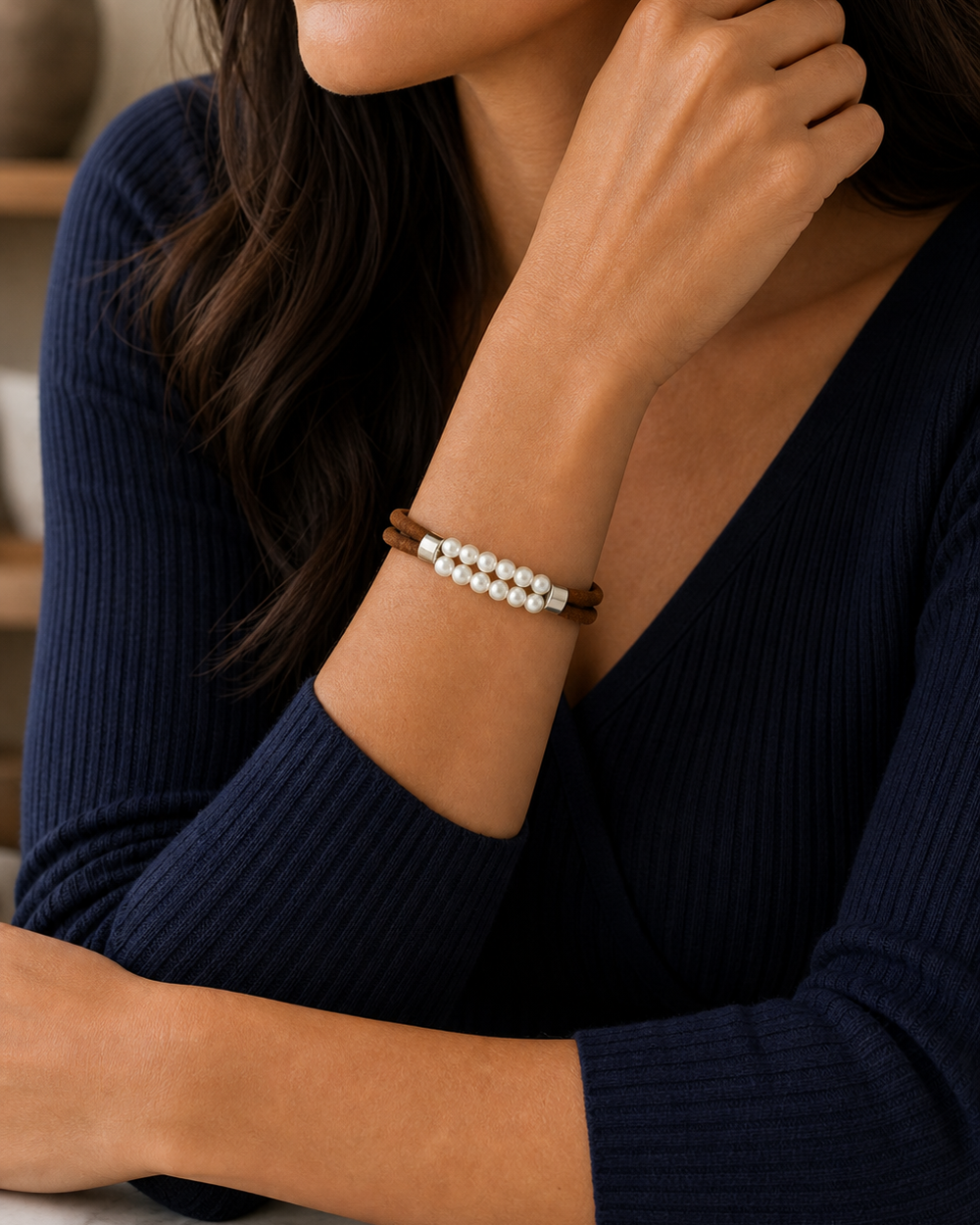 True 4:5 wrist portrait featuring The Cognac Pearl Bracelet with a navy sleeve