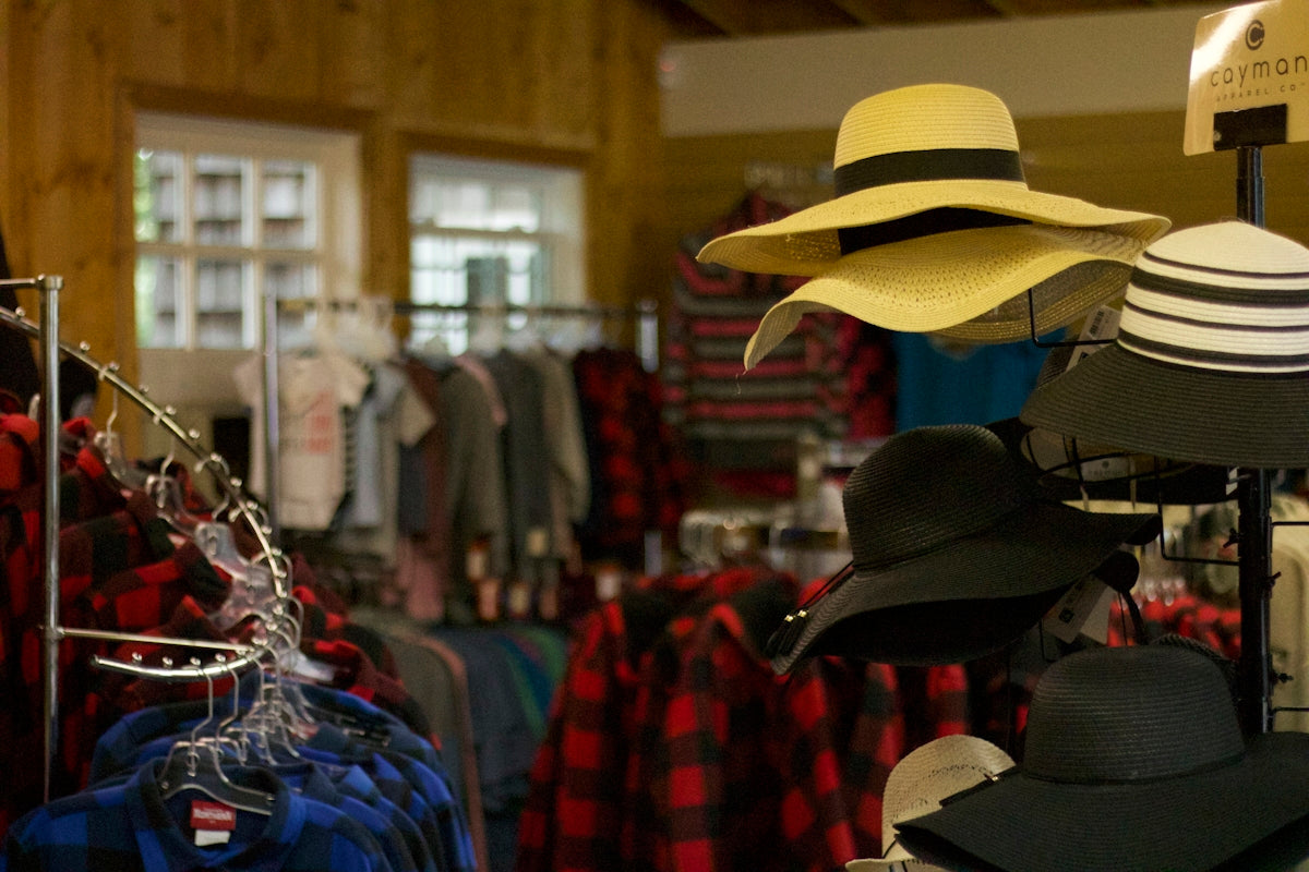 assorted clothes hanged on clothes rack