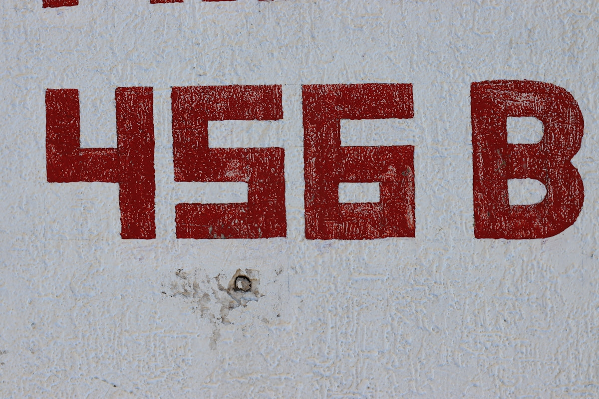 Red numbers 456 b are printed on a white surface.