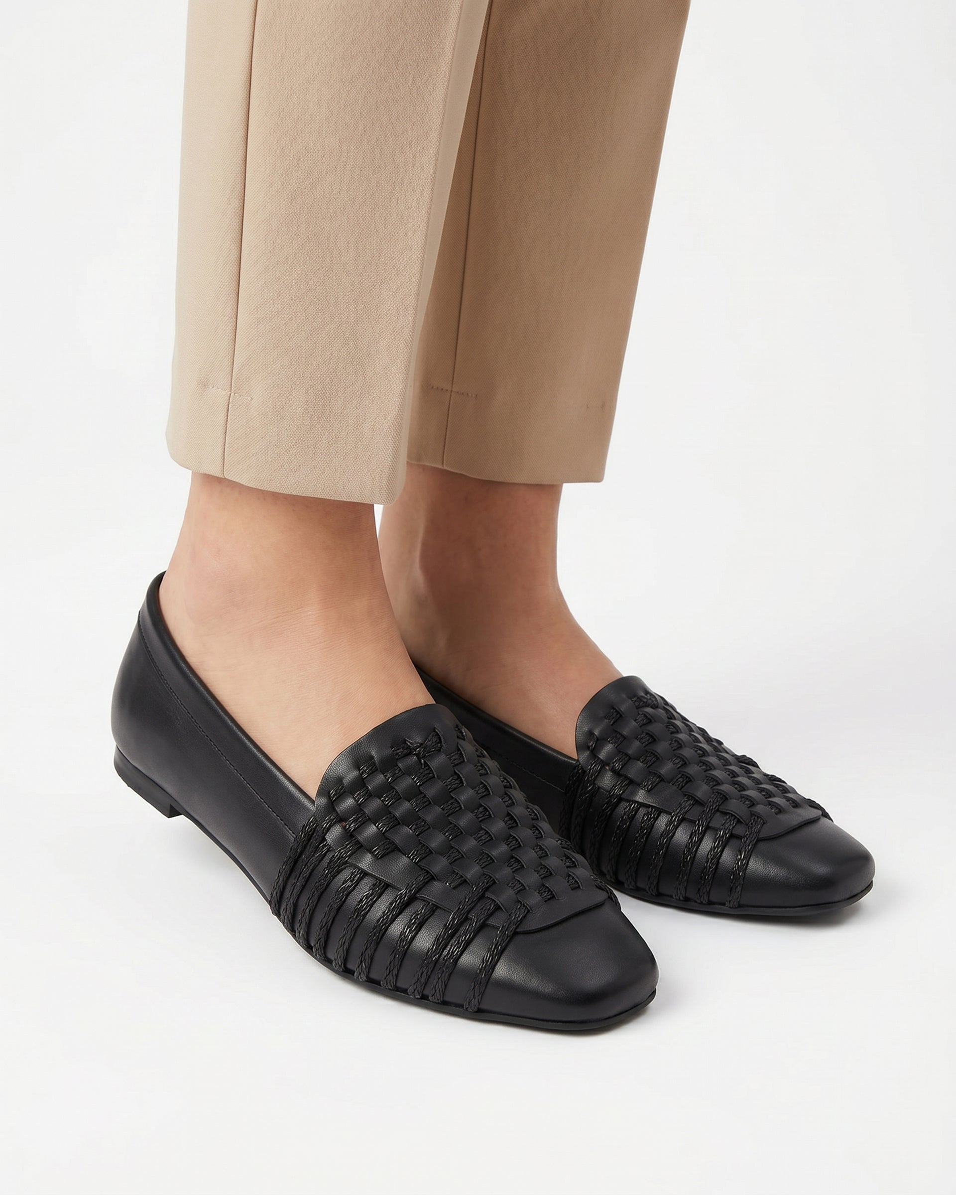 The Romy Woven Loafer - Black faux leather woven slip-on flat 1