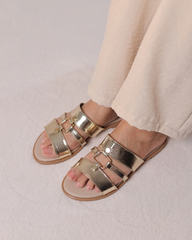 صندل ذهبي معدني بقطعة ديكور