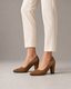 Noctelle camel-brown suede pointed-toe block heel pumps on female model - view 1