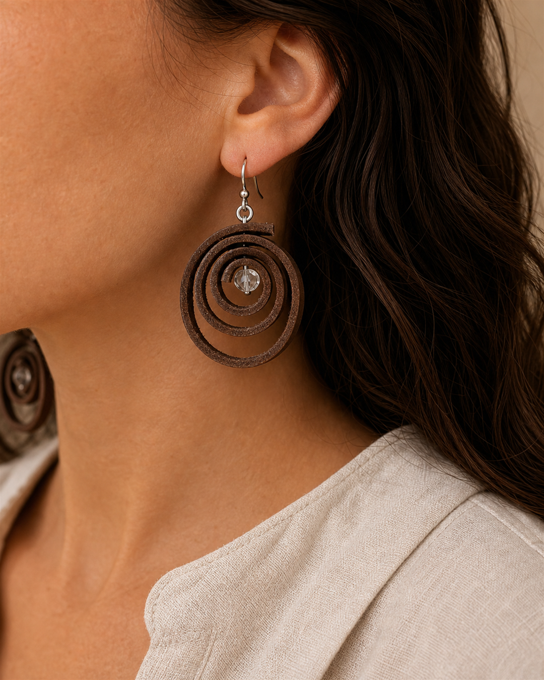 Rovena brown spiral drop earrings with silver hook and clear crystal bead - view 1