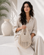 Solmara cream macrame mini beach bag on female model - view 5