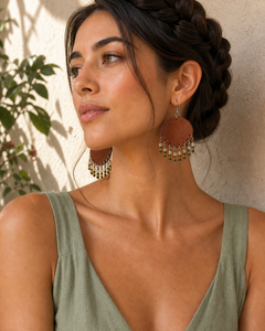 True 4:5 sunlit lifestyle portrait of a woman wearing The Cognac Fringe Earrings