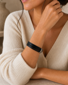 Cream sweater wrist portrait featuring The Noir Wrap Bracelet