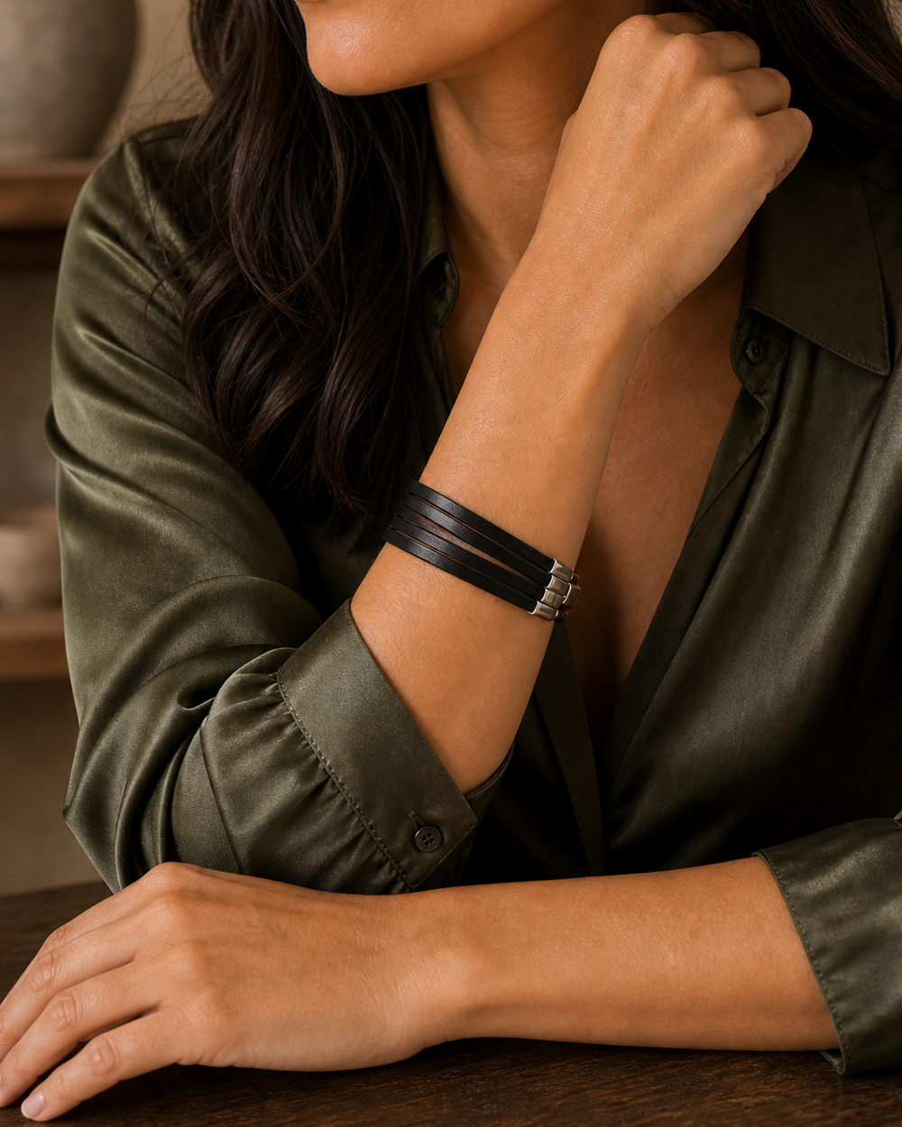 Tabletop lifestyle portrait of The Noir Wrap Bracelet