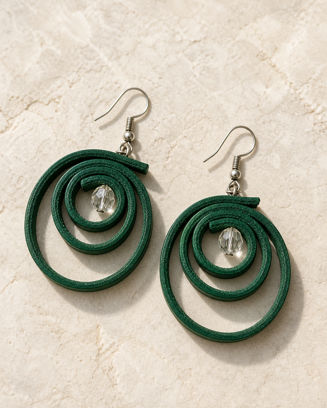 Verdant Orbit emerald green spiral drop earrings with silver hook and crystal bead - view 1