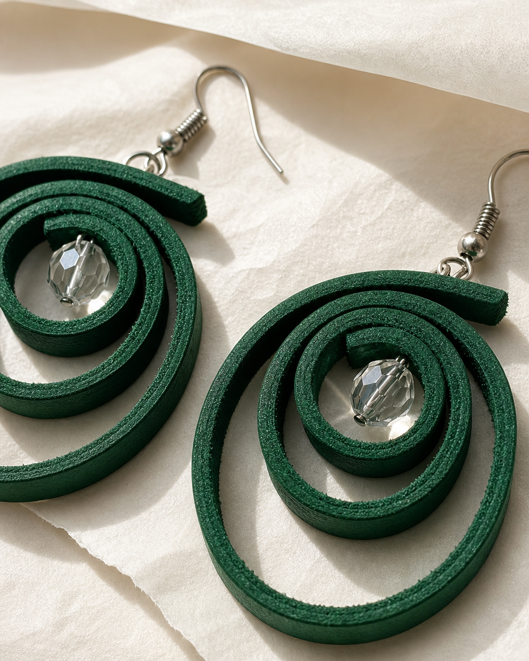 Verdant Orbit emerald green spiral drop earrings with silver hook and crystal bead - view 2